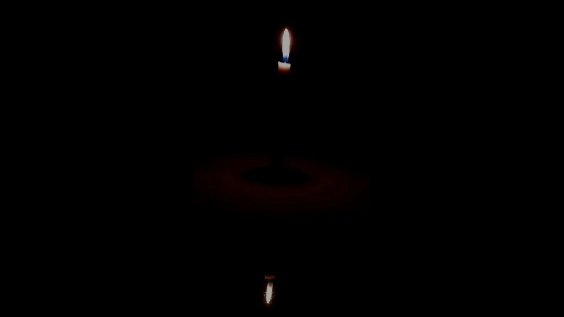 The Flickering Light From A Candle · Free Stock Video