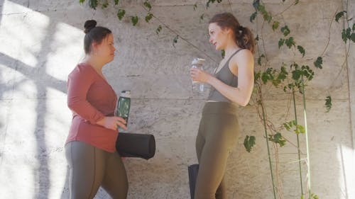 Two Women Talking After Working Out