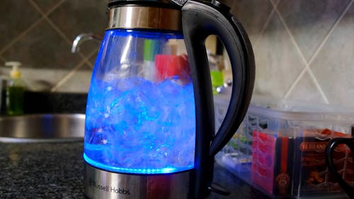 Glass kettle boiling electric hi-res stock photography and images