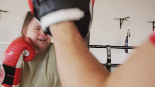 Woman Practicing Boxing With a Personal Trainer