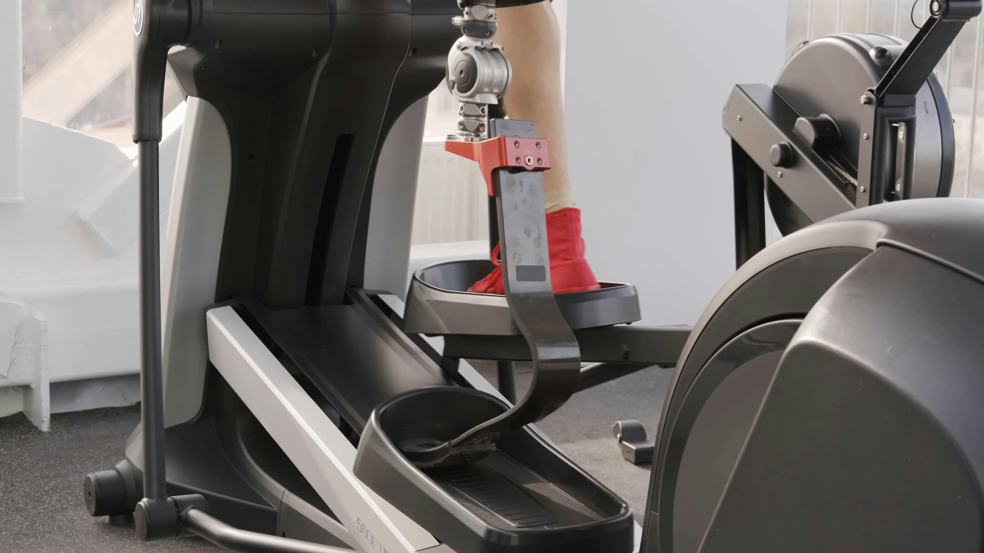 A Man Exercising On A Stationary Walking Machine · Free Stock Video