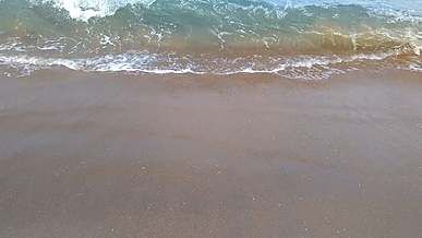 a shot of beach shore waves