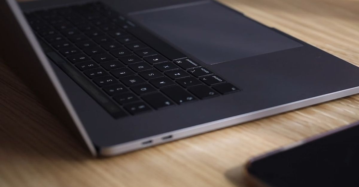 A Close-up Shot of a Hand Tapping a Laptop Touchpad Free Stock Video ...