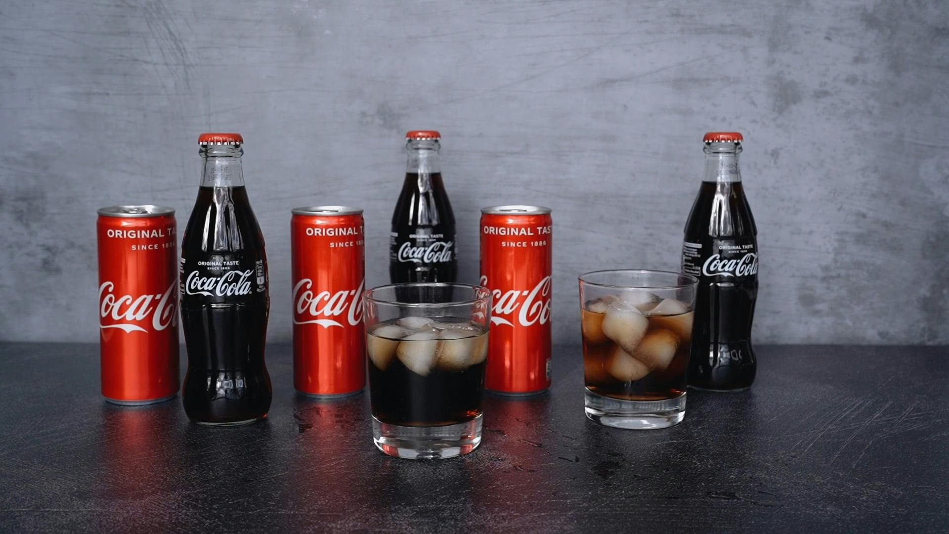 Putting Ice On A Glass Of Coke · Free Stock Video