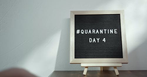 Counting The Days In Quarantine On A Memo Board