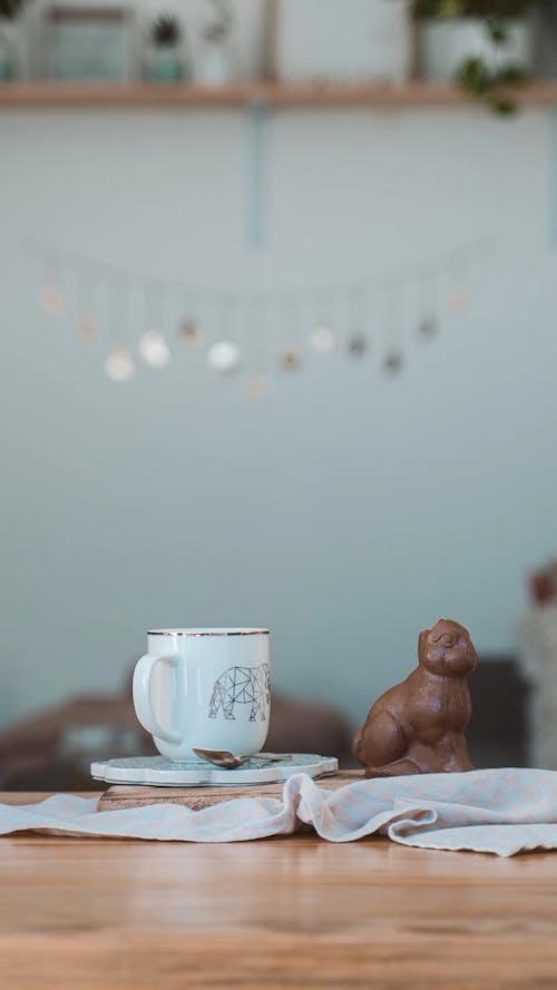 A Disappearing Chocolate Bunny Over The Table