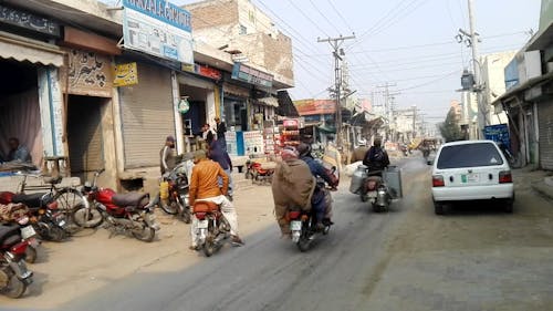 A Crowd Of People On The Busy Market Street