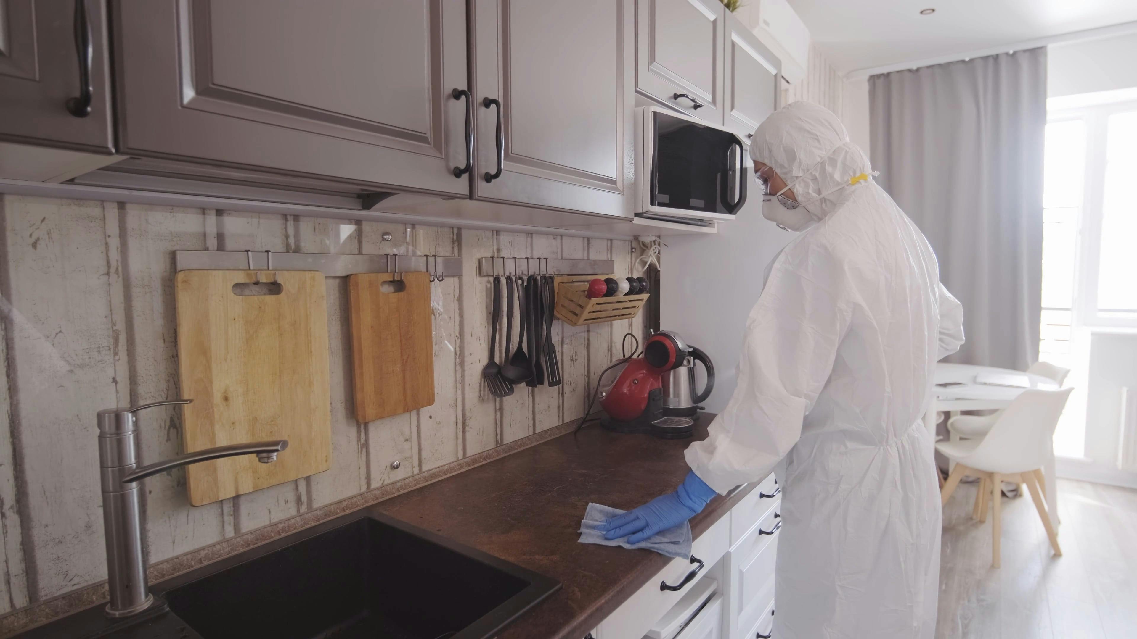 A Person Disinfecting the Kitchen Area \u00b7 Free Stock Video