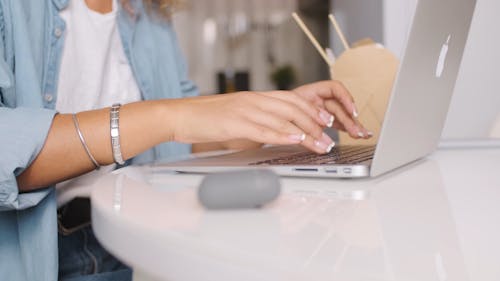 Person Using Her Laptop