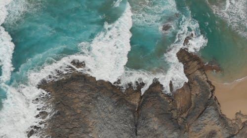 A Drone Video of Waves Crashing the Rocky Shore