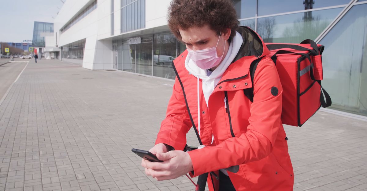 Delivery Man Using Remote A Delivery Man Using His Cellphone Free Stock Video Footage, Royalty ...