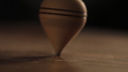 Close-up Footage Of A Spinning Top