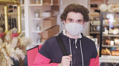 A Delivery Man Wearing Face Mask For Safety And Protection
