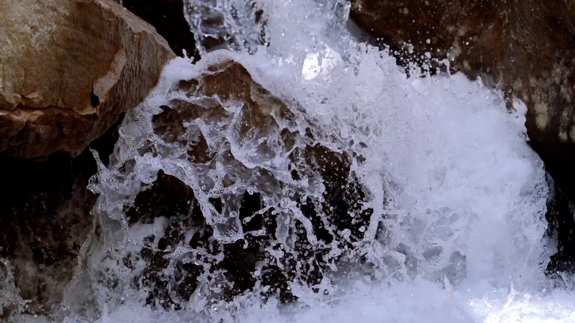 a waterfall cascading through rocks 4173994