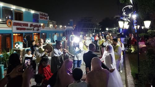 A Newly Wed Couple Performing A Traditional Dance 