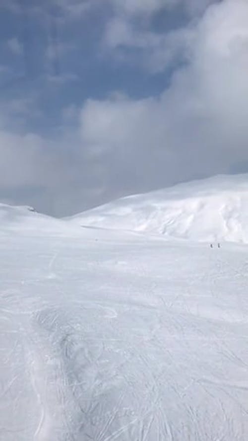 Scenery of People Skiing in Ski Resort