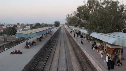 Passengers Waiting For The Train in The Station