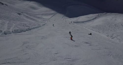People Skiing at the Mountain