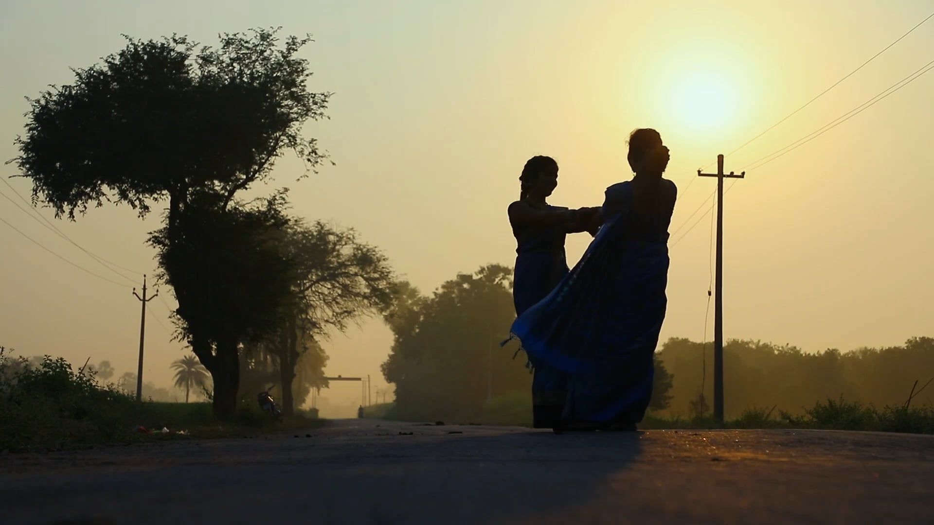 Two Women Holding Hands Spinning On An Empty Road Free Stock Video ...