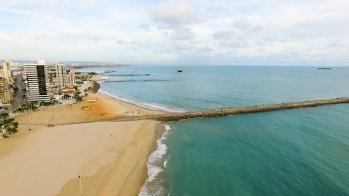 drone-shot-of-ocean-waves-at-the-seashore