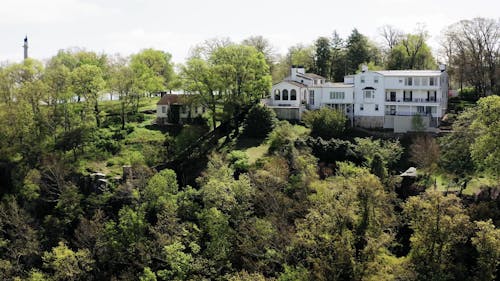 Drone Footage Of A House On Top Of The Mountain