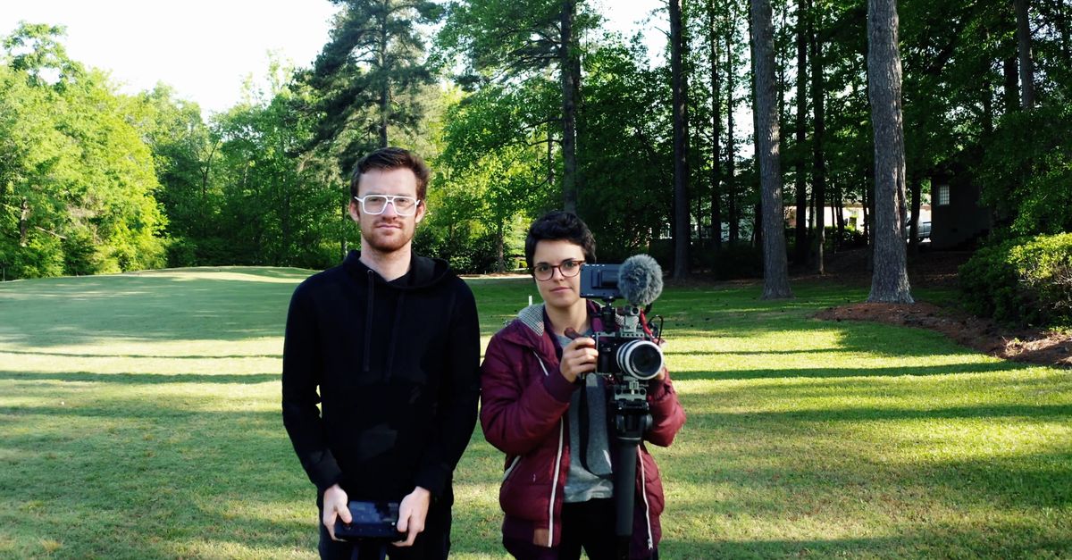 Camera Pull Out Example Pull-out shot of People Holding a Camera Free Stock Video Footage ...
