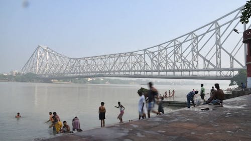 People Bathing in the River