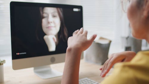 Women Engaged in a Video Call