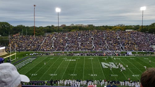 Sport Fans Packing A Stadium For A Game Of Football