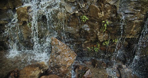 A Waterfall Cascading Down The Cliffs