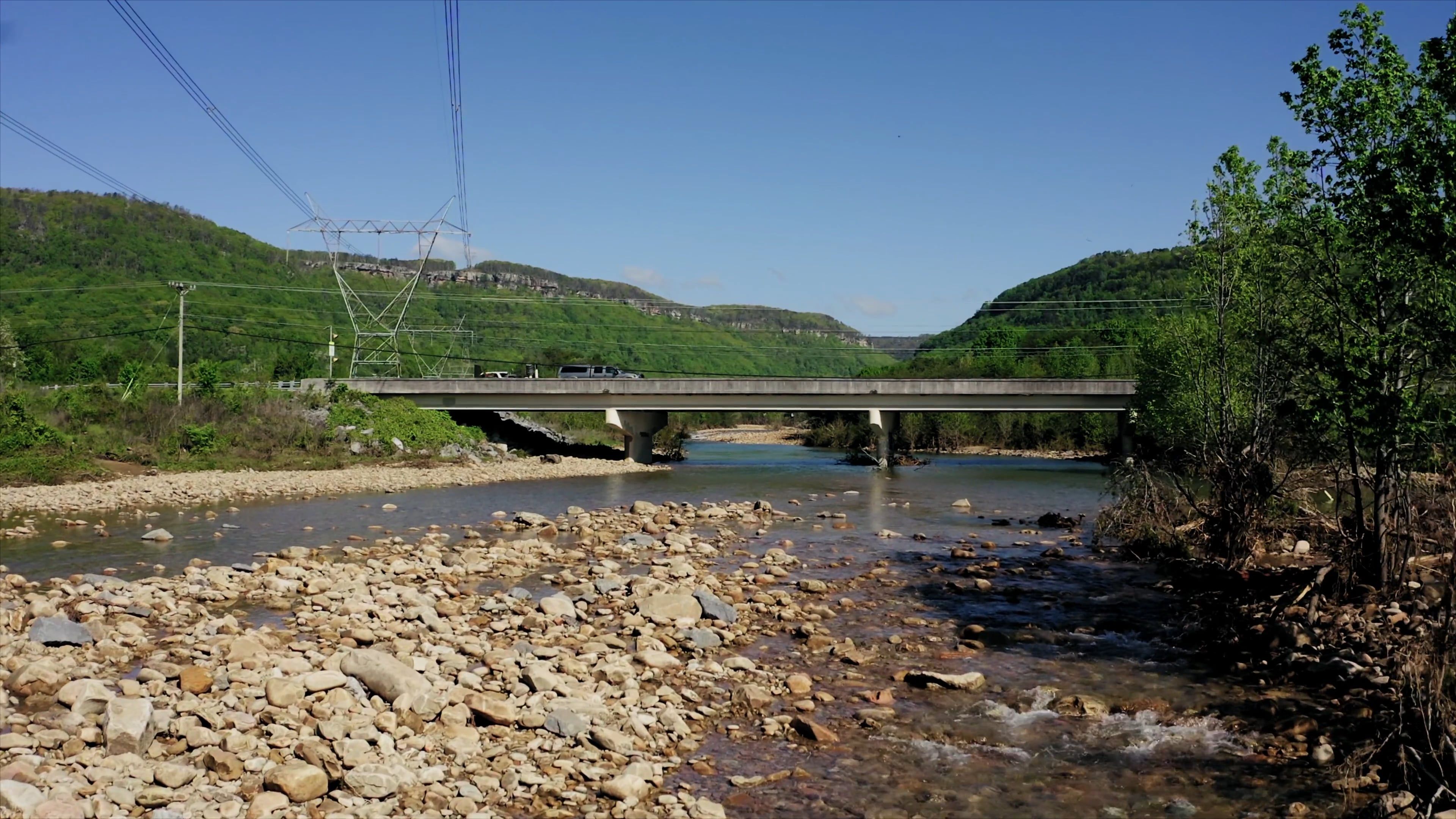 A Fly-by Shot of a Drone Over the Rocky River Free Stock Video Footage ...