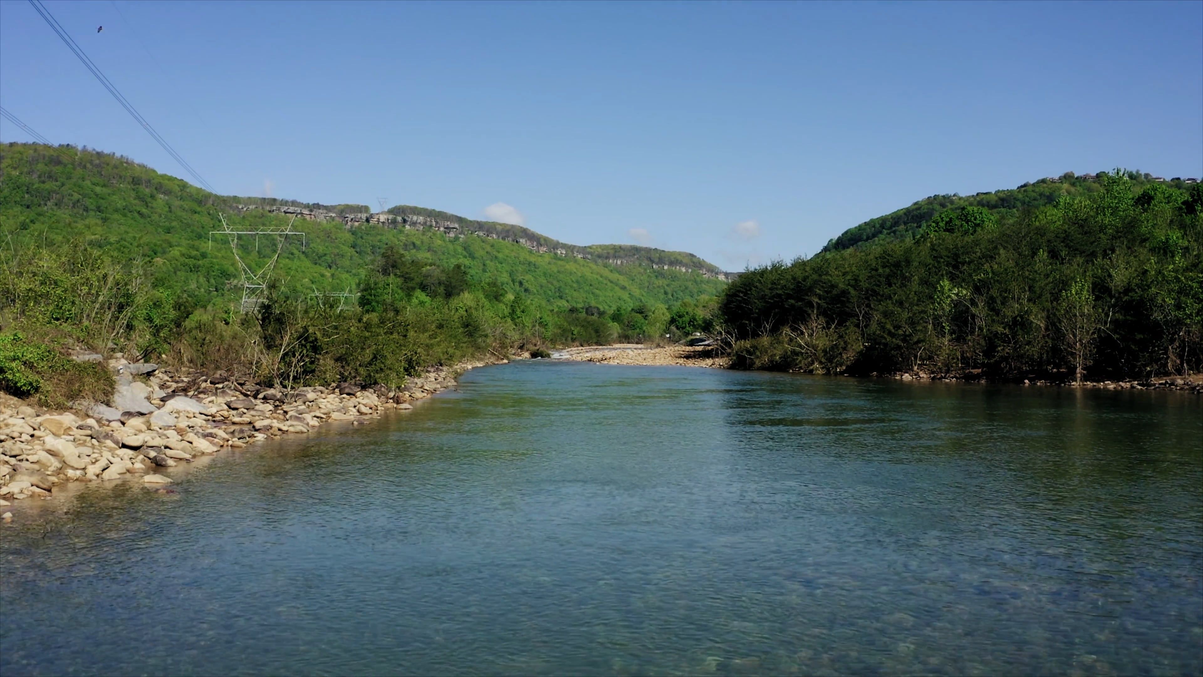 A Fly-by Shot of a Drone Over the Rocky River · Free Stock Video