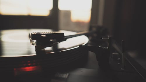 Close-up View Of A Classic Turntable Playing Music