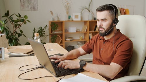 Video Of A Man Using A Laptop