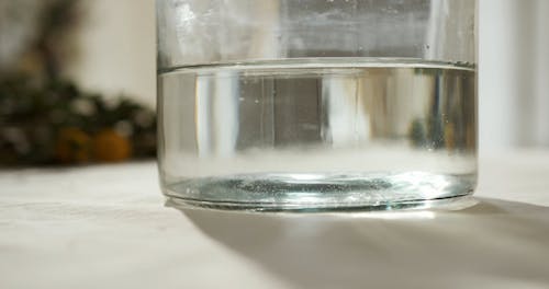 Dissolving Salt On A Glass Of Water