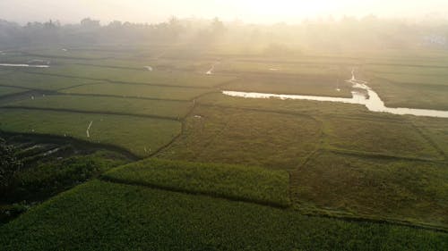 Drone Footage Of A Farming Community In Early Morning