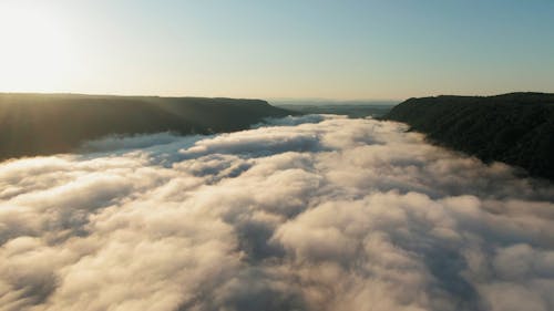 Sea Of Low Lying Clouds Covers The Mountains Valley