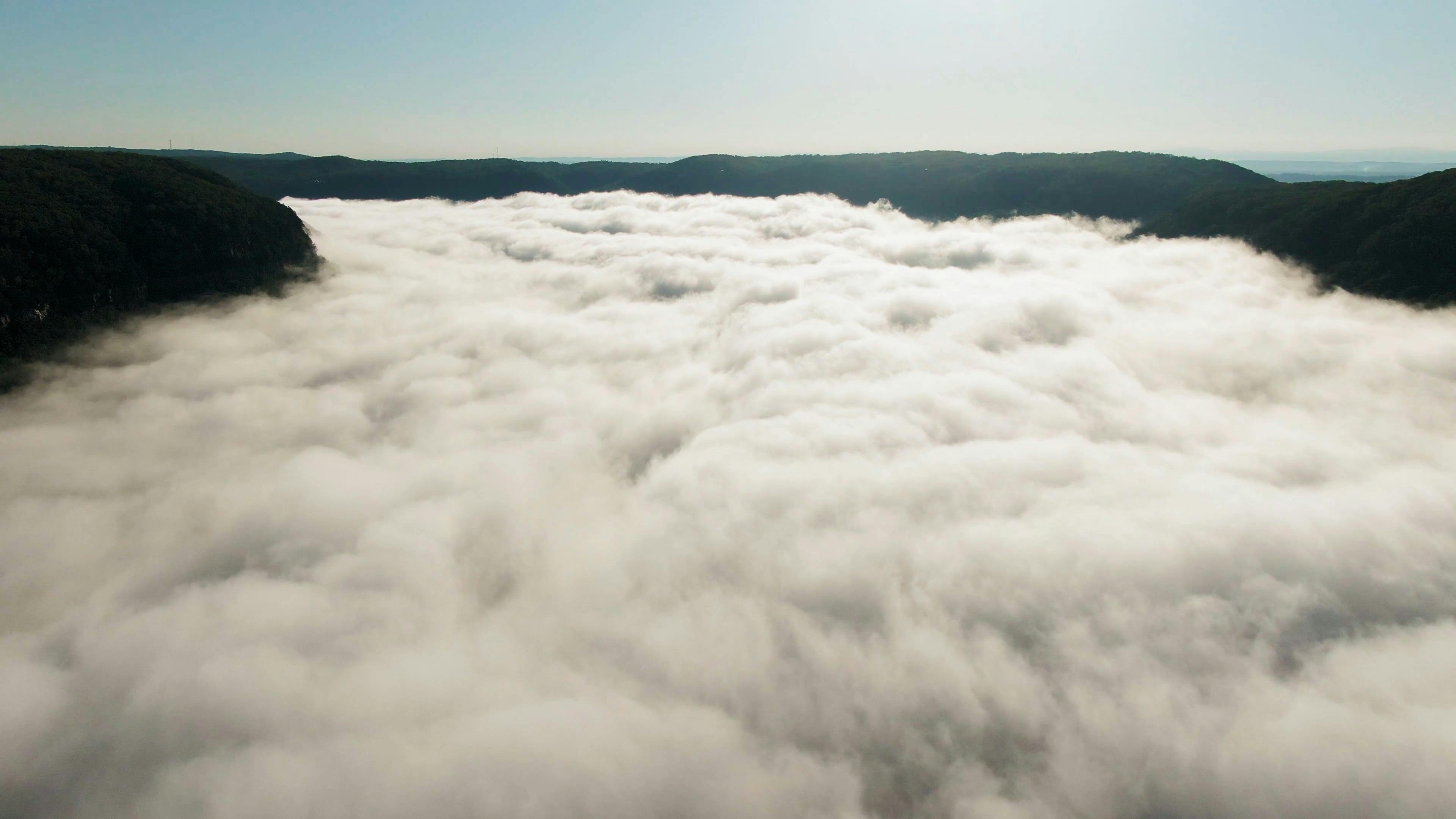 Thick Low Lying Clouds Covering A Mountain Valley · Free Stock Video Thick Low Lying Clouds Covering A Mountain Valley · Free Stock Video