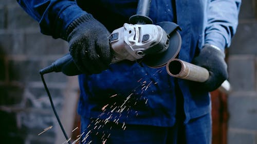 Person Using an Angle Grinder
