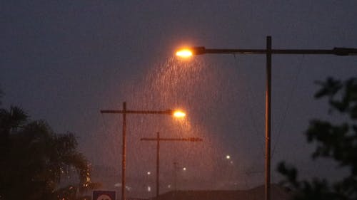 Visible Rain At Night Because Of The Street Lamps Light