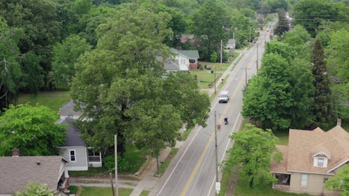 Tracking A Motorcycle Rider Driving Through A Residential Community