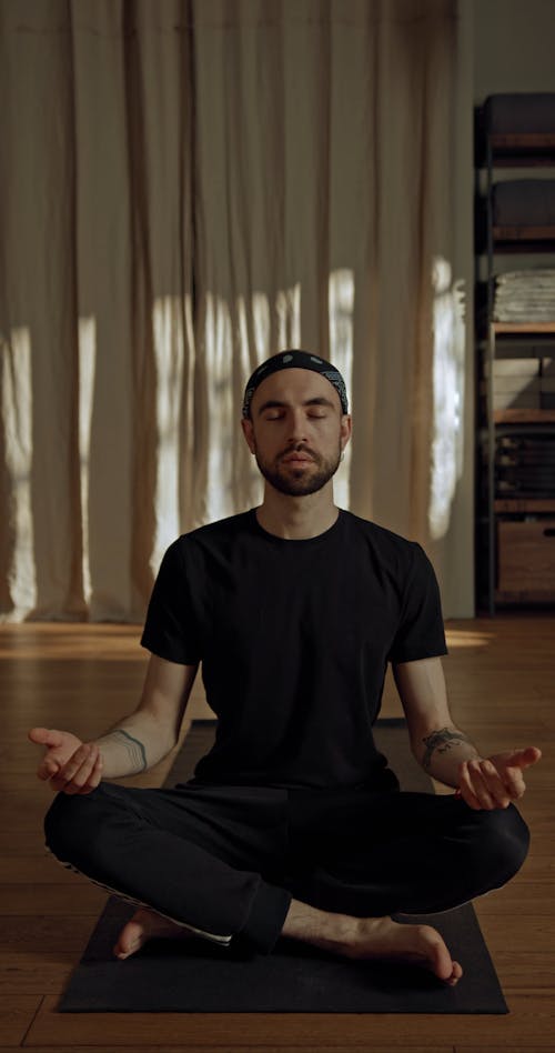 Man Doing A Yoga Exercise 