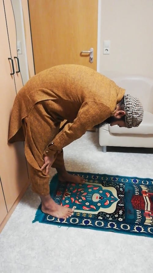 A Man Praying On Time For Salah