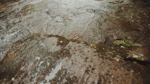 River Flowing Into A Waterfalls