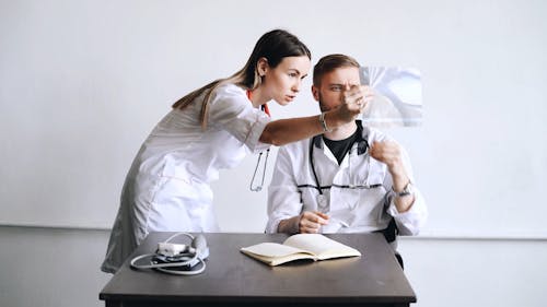 Doctors Checking at an X-Ray Film