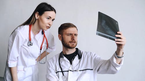 Doctors Diagnosing An X-ray