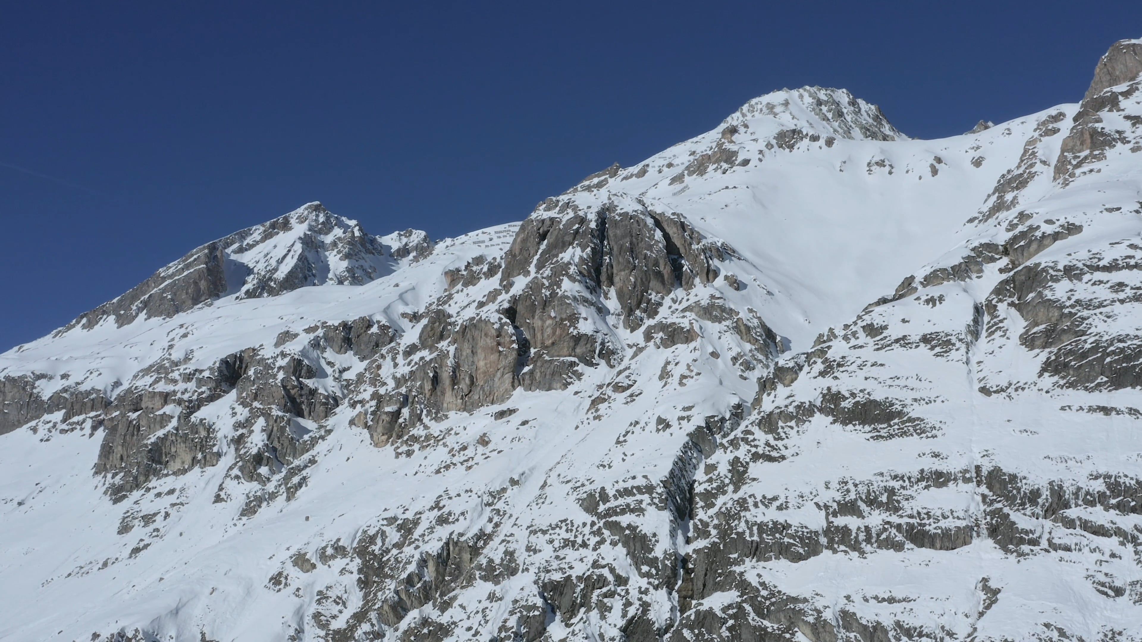 Drone Footage of Mountain Covered with Snow · Free Stock Video