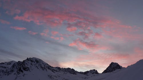Watching Sunrise on Snow Mountain