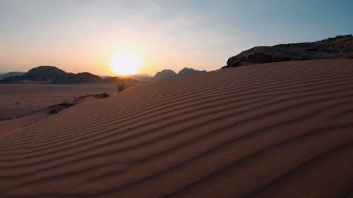 Rippled Sand In The Desert With View Of Sunset
