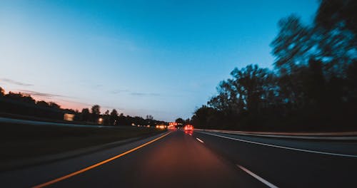 Vehicles On The Road At Evening Time In Timelapse Mode